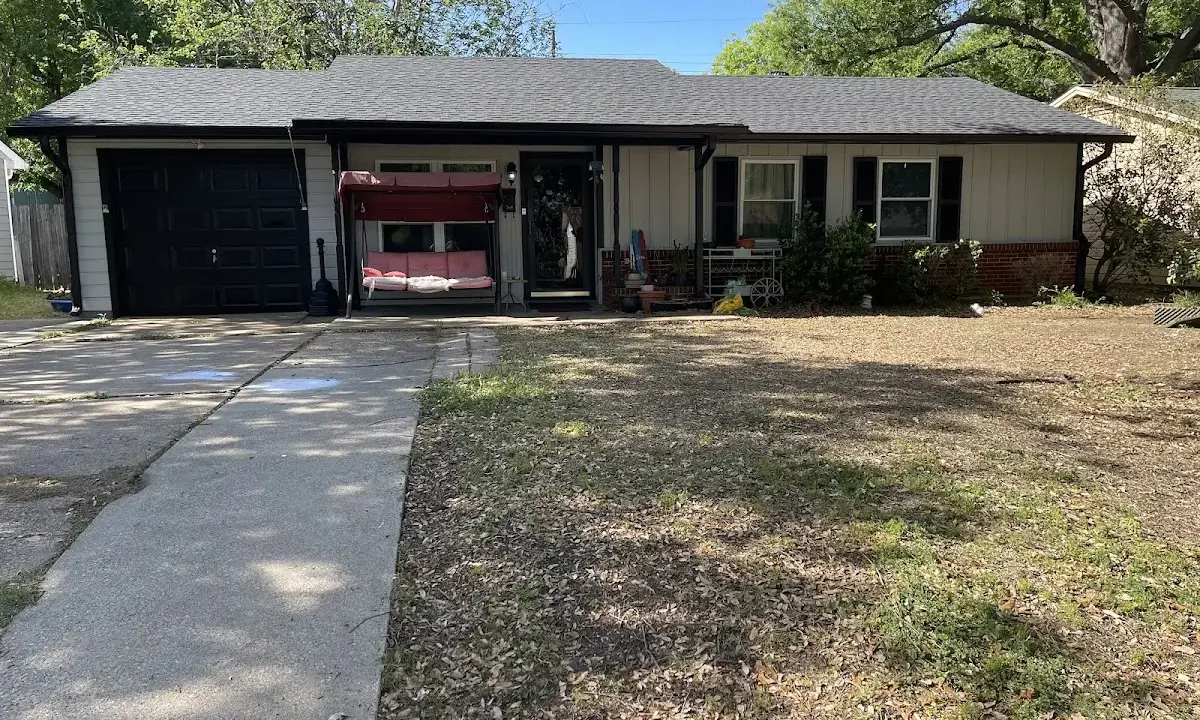 Metal Roof Installation crew at work on a residential roof in Vidor